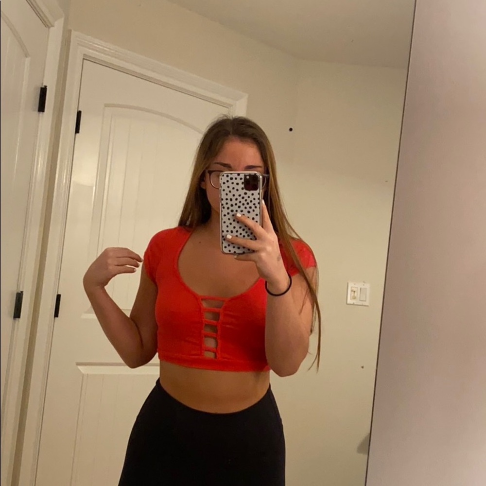 Red over the shoulder cropped top